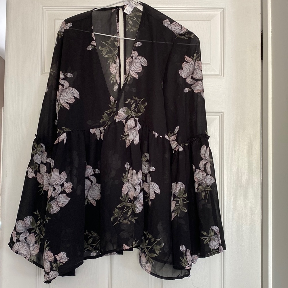 Sheer black floral blouse